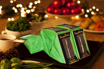 Christmas dinner table set with Jasmine's Jamaican Rum Cake